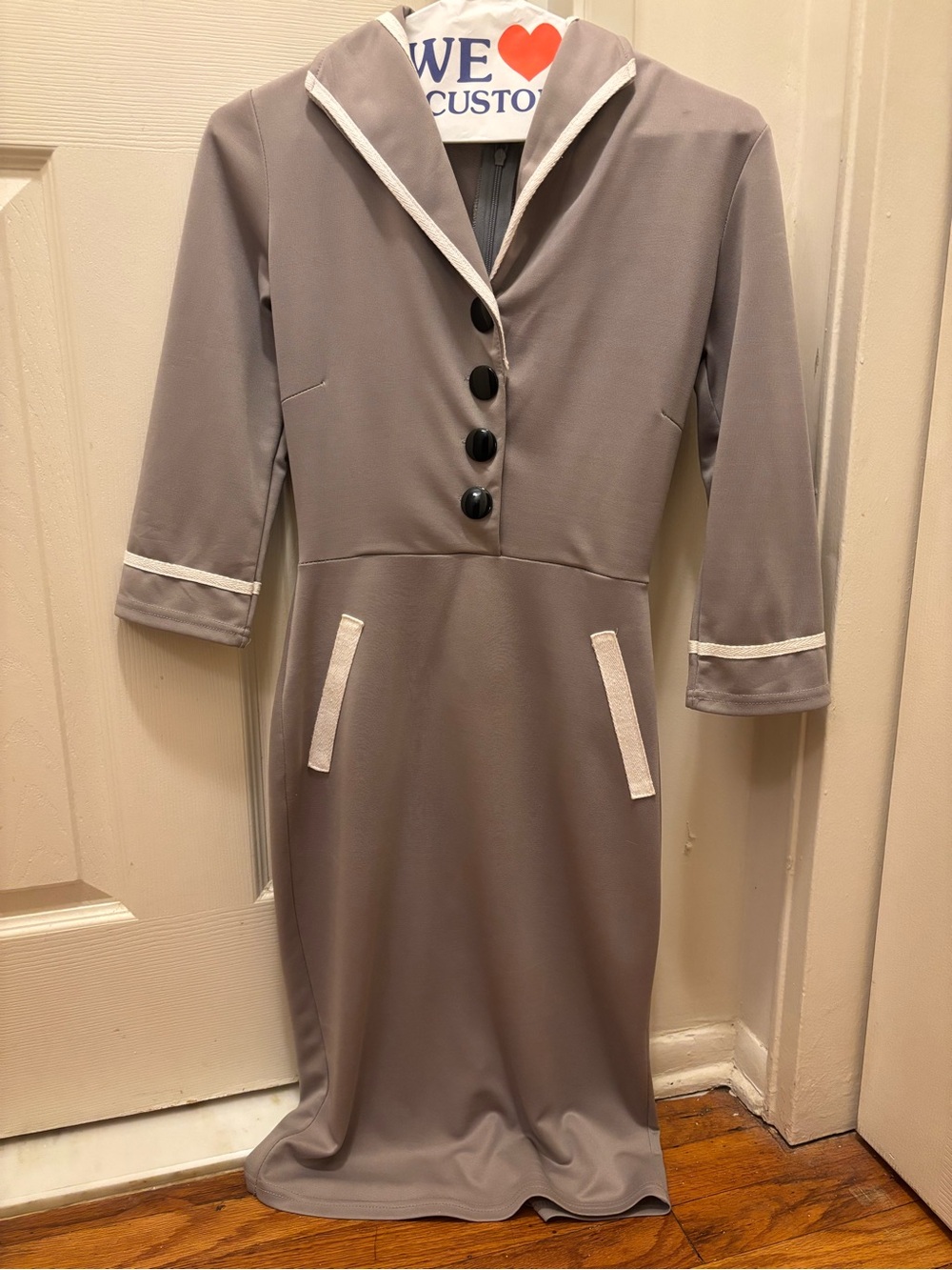 Gray Wiggle Dress with White Trim and Black Buttons